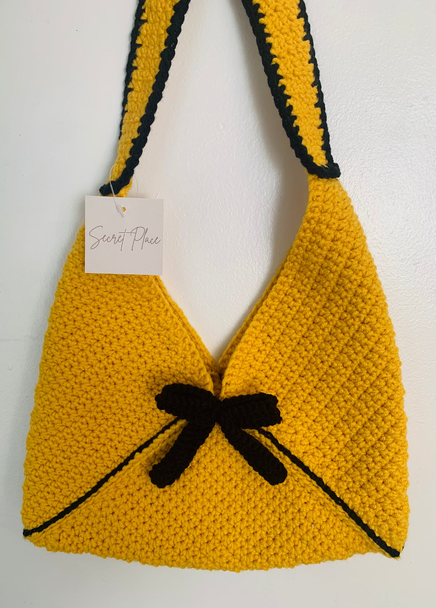 Crochet bag with bow